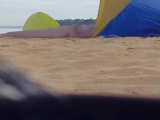 Attractive milf spied at beach (please comment)